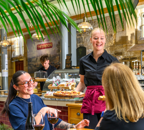 Cafe bar with people being served